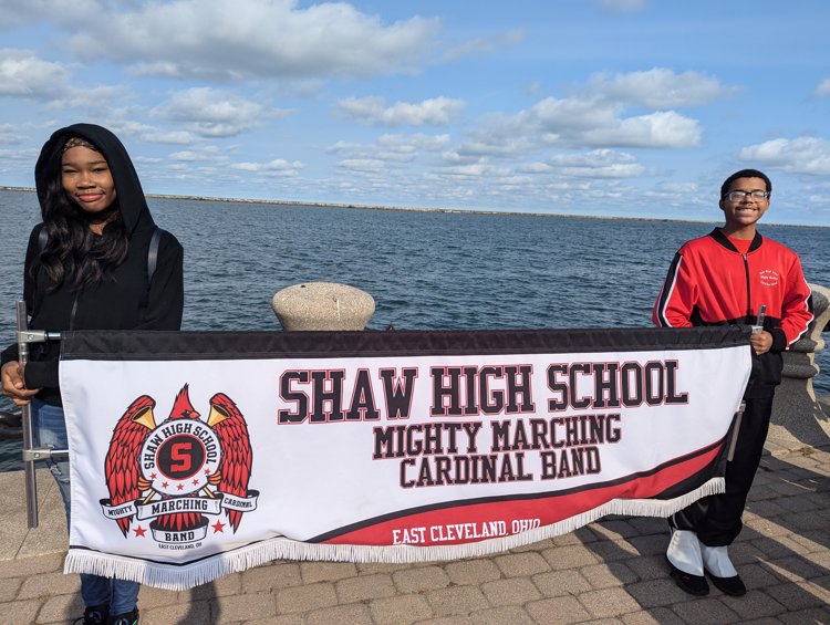 2024 Mighty Cardinal Marching Band banner displayed at Voinovich Park in Cleveland